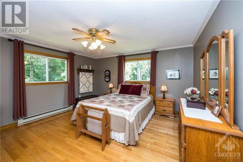 Master bedroom with 2 windows - 3303 Drummond Conc 9A Township, Balderson, ON - Indoor Photo Showing Bedroom