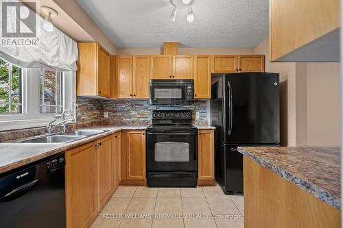 50 - 535 Windflower Crescent, Kitchener, ON - Indoor Photo Showing Kitchen With Double Sink