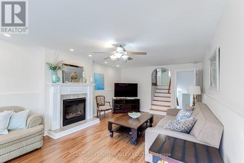 14 Manvers Drive, Kawartha Lakes, ON - Indoor Photo Showing Living Room With Fireplace