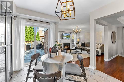 130 Worden Drive, Clarington (Courtice), ON - Indoor Photo Showing Dining Room With Fireplace