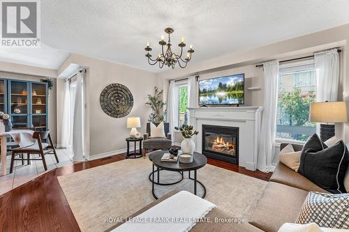 130 Worden Drive, Clarington (Courtice), ON - Indoor Photo Showing Living Room With Fireplace