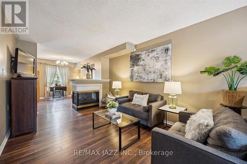 74 Trewin Lane, Clarington (Bowmanville), ON - Indoor Photo Showing Living Room With Fireplace