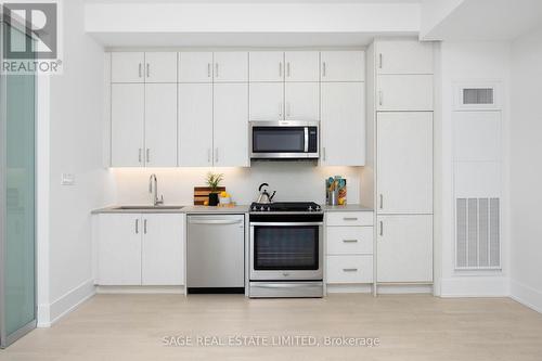 102 - 14 Dewhurst Boulevard, Toronto, ON - Indoor Photo Showing Kitchen