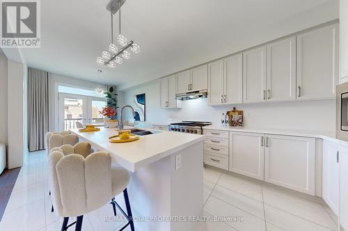 73 Fruitful Crescent, Whitby, ON - Indoor Photo Showing Kitchen With Double Sink