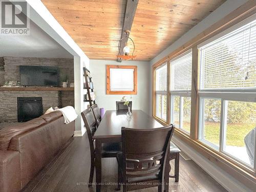 127 Maskinonge Road, Tay, ON - Indoor Photo Showing Dining Room With Fireplace