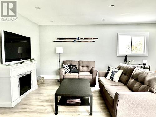 127 Maskinonge Road, Tay, ON - Indoor Photo Showing Living Room With Fireplace