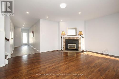 20 - 2021 Sixth Line, Oakville, ON - Indoor Photo Showing Living Room With Fireplace