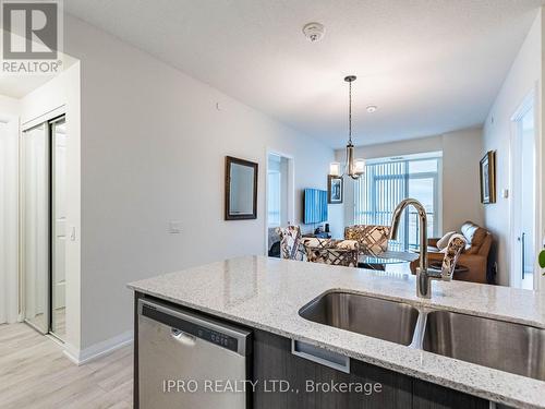 1916 - 35 Watergarden Drive, Mississauga, ON - Indoor Photo Showing Kitchen With Double Sink