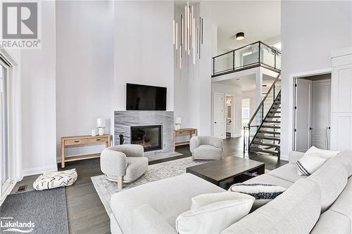 107 Sladden Court, Thornbury, ON - Indoor Photo Showing Living Room With Fireplace