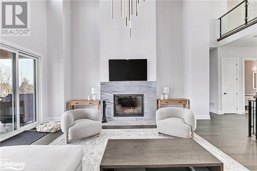 107 Sladden Court, Thornbury, ON - Indoor Photo Showing Living Room With Fireplace