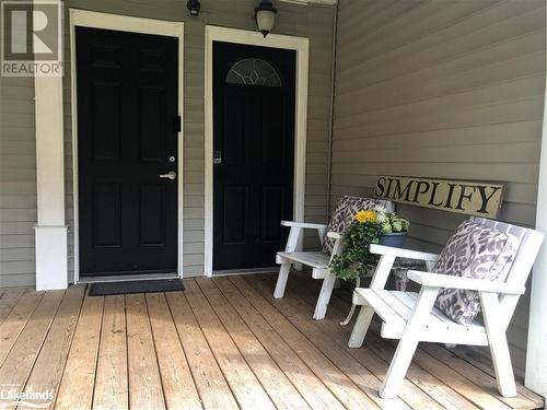 Front doors, left door leads to second floor apartment, right door entrance to main part of house. - 185 South Fairy Lake Road, Huntsville, ON - Outdoor With Deck Patio Veranda With Exterior