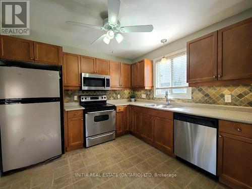 1704 Mickleborough Drive, London, ON - Indoor Photo Showing Kitchen With Double Sink