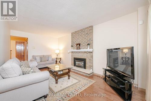 694 Amaretto Avenue, Pickering, ON - Indoor Photo Showing Living Room With Fireplace