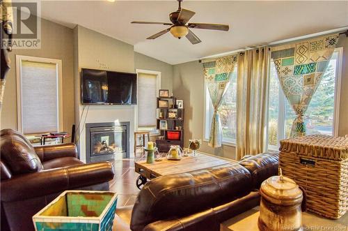 35 Beauvista Avenue, Darlings Island, NB - Indoor Photo Showing Living Room With Fireplace