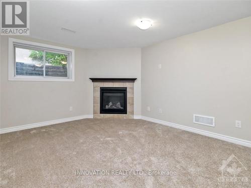 502 Muscari Street, Ottawa, ON - Indoor Photo Showing Living Room With Fireplace