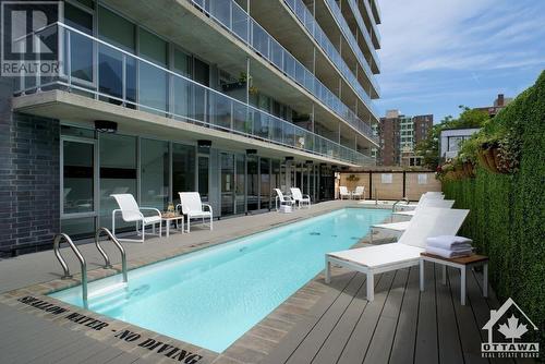 300 Lisgar Street Unit#209, Ottawa, ON - Outdoor With In Ground Pool With Balcony