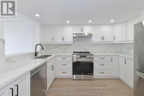 706 - 7420 Bathurst Street, Vaughan, ON - Indoor Photo Showing Kitchen With Double Sink With Upgraded Kitchen