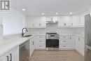 706 - 7420 Bathurst Street, Vaughan, ON  - Indoor Photo Showing Kitchen With Double Sink With Upgraded Kitchen 