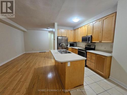 Upper - 868 Oasis Drive N, Mississauga, ON - Indoor Photo Showing Kitchen With Double Sink