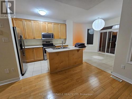 Upper - 868 Oasis Drive N, Mississauga, ON - Indoor Photo Showing Kitchen With Double Sink