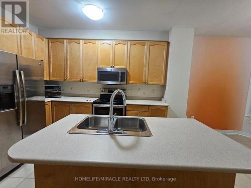 Upper - 868 Oasis Drive N, Mississauga, ON - Indoor Photo Showing Kitchen With Double Sink