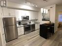 405 - 40 Horseshoe Boulevard, Oro-Medonte, ON  - Indoor Photo Showing Kitchen With Stainless Steel Kitchen 