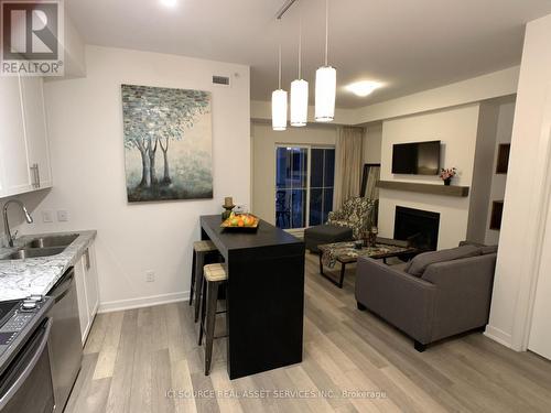 405 - 40 Horseshoe Boulevard, Oro-Medonte, ON - Indoor Photo Showing Kitchen With Fireplace With Double Sink