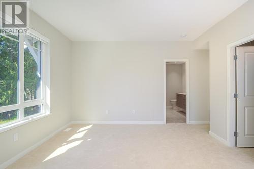 143 1330 Wellon Street, Coquitlam, BC - Indoor Photo Showing Other Room