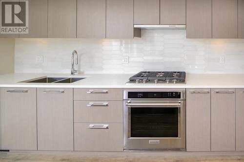 143 1330 Wellon Street, Coquitlam, BC - Indoor Photo Showing Kitchen With Double Sink With Upgraded Kitchen