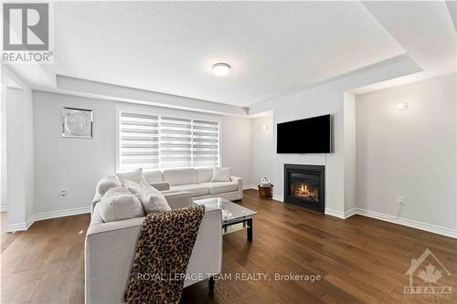 612 Rye Grass Way, Ottawa, ON - Indoor Photo Showing Living Room With Fireplace