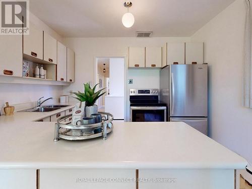 20 Sundance Crescent, Toronto, ON - Indoor Photo Showing Kitchen With Double Sink