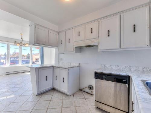 Cuisine - 100 Rue Leduc, Sainte-Thérèse, QC - Indoor Photo Showing Kitchen With Double Sink