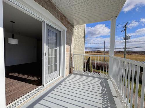 Balcony - 12 Place Du Marché, Saint-Joseph-Du-Lac, QC - Outdoor With Deck Patio Veranda With Exterior