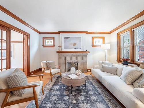 24 Chilton Rd, Toronto, ON - Indoor Photo Showing Living Room With Fireplace