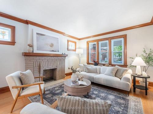 24 Chilton Rd, Toronto, ON - Indoor Photo Showing Living Room With Fireplace