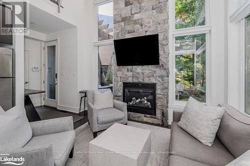 48 Carrick Trail, Gravenhurst (Muskoka (S)), ON - Indoor Photo Showing Living Room With Fireplace