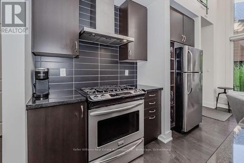 48 Carrick Trail, Gravenhurst (Muskoka (S)), ON - Indoor Photo Showing Kitchen With Fireplace With Upgraded Kitchen