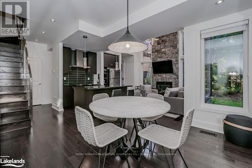 48 Carrick Trail, Gravenhurst (Muskoka (S)), ON - Indoor Photo Showing Dining Room With Fireplace