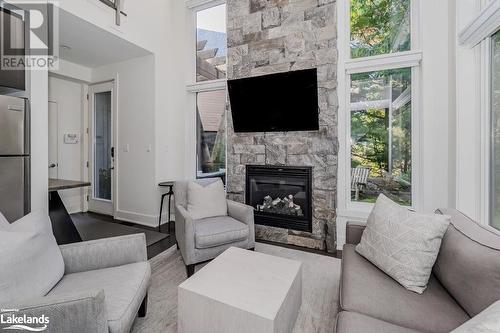 48 Carrick Trail, Gravenhurst, ON - Indoor Photo Showing Living Room With Fireplace