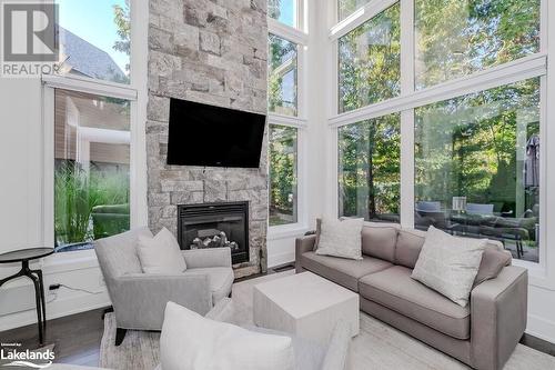 48 Carrick Trail, Gravenhurst, ON - Indoor Photo Showing Living Room With Fireplace