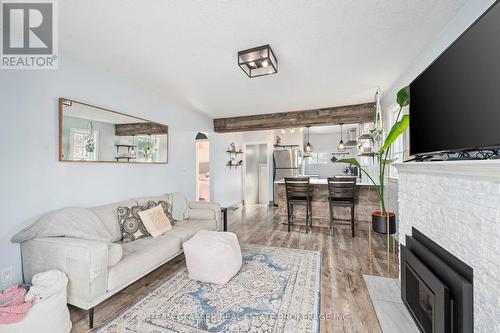 7 Graydon Street, London, ON - Indoor Photo Showing Living Room With Fireplace