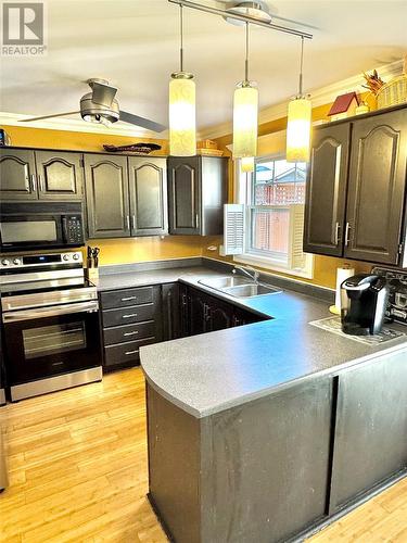 3 Whiteway Place, Clarenville, NL - Indoor Photo Showing Kitchen With Double Sink