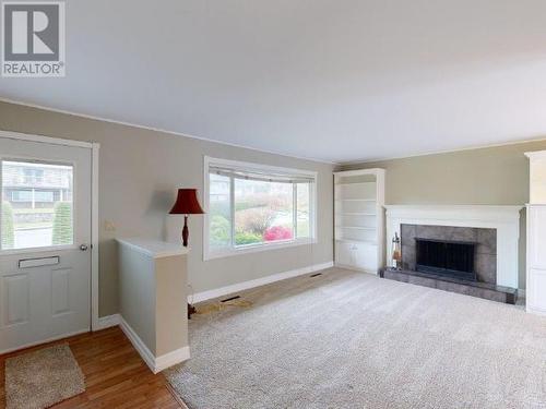 4063 Joyce Ave, Powell River, BC - Indoor Photo Showing Living Room With Fireplace