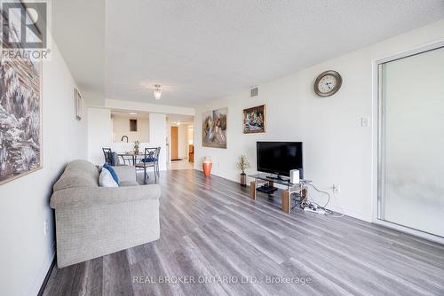 608 - 4727 Sheppard Avenue E, Toronto, ON - Indoor Photo Showing Living Room