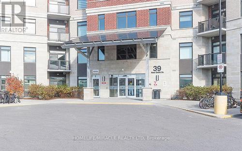 516 - 39 New Delhi Drive, Markham, ON - Outdoor With Balcony With Facade