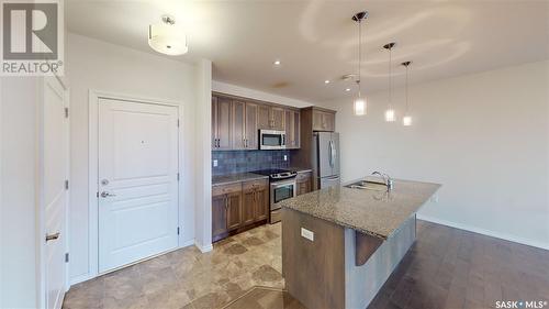 307 1715 Badham Boulevard, Regina, SK - Indoor Photo Showing Kitchen With Double Sink With Upgraded Kitchen