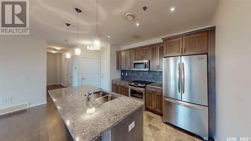 307 1715 Badham Boulevard, Regina, SK - Indoor Photo Showing Kitchen With Double Sink With Upgraded Kitchen