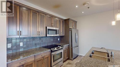 307 1715 Badham Boulevard, Regina, SK - Indoor Photo Showing Kitchen With Upgraded Kitchen