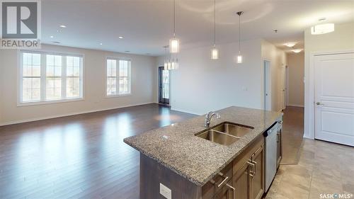 307 1715 Badham Boulevard, Regina, SK - Indoor Photo Showing Kitchen With Double Sink