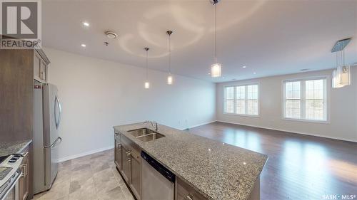 307 1715 Badham Boulevard, Regina, SK - Indoor Photo Showing Kitchen With Double Sink With Upgraded Kitchen